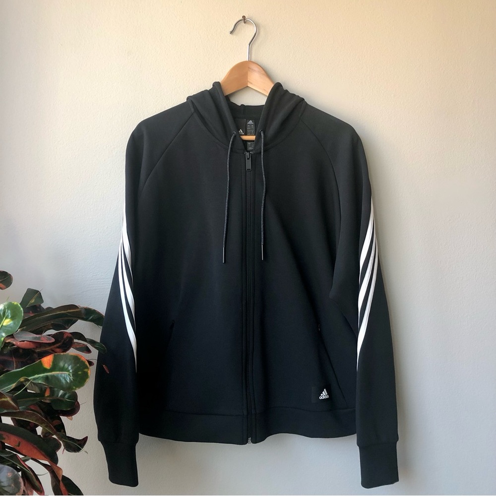 ADIDAS Women’s Future Icons Three Stripes Hooded Full Zip Black Track Jacket.